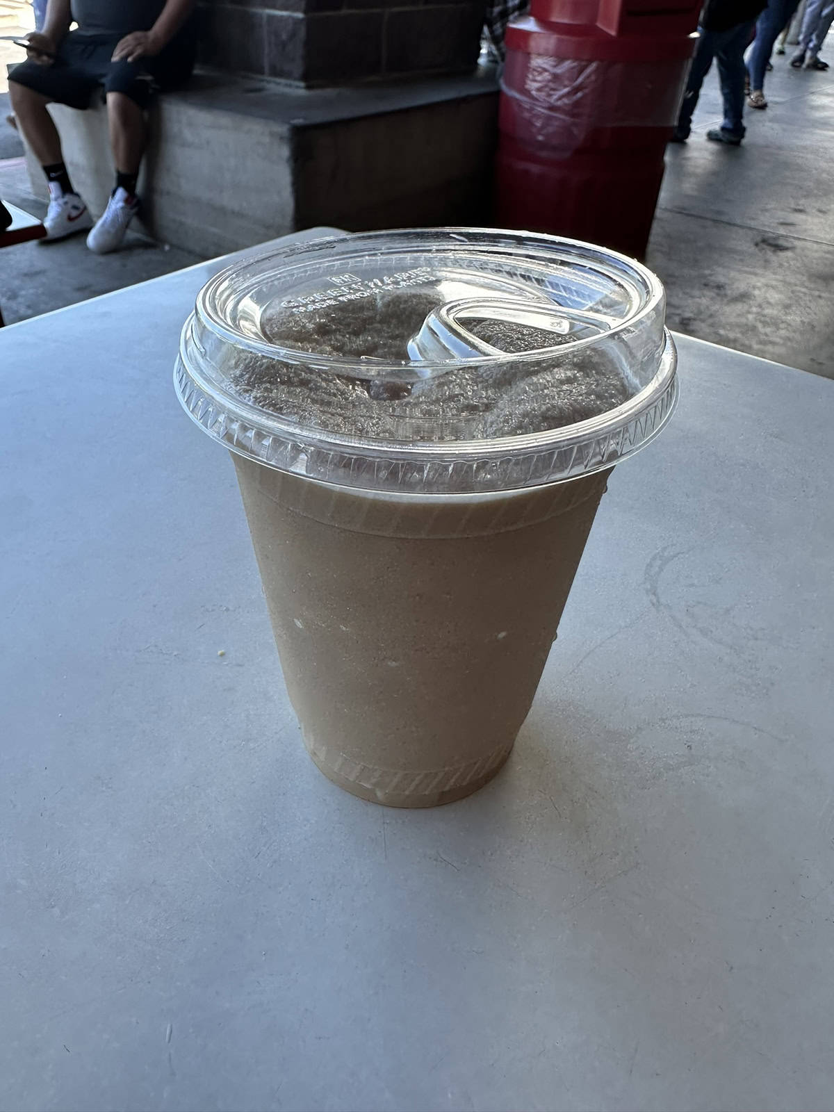 Image of the Costco food court frozen latte sitting on a table. 