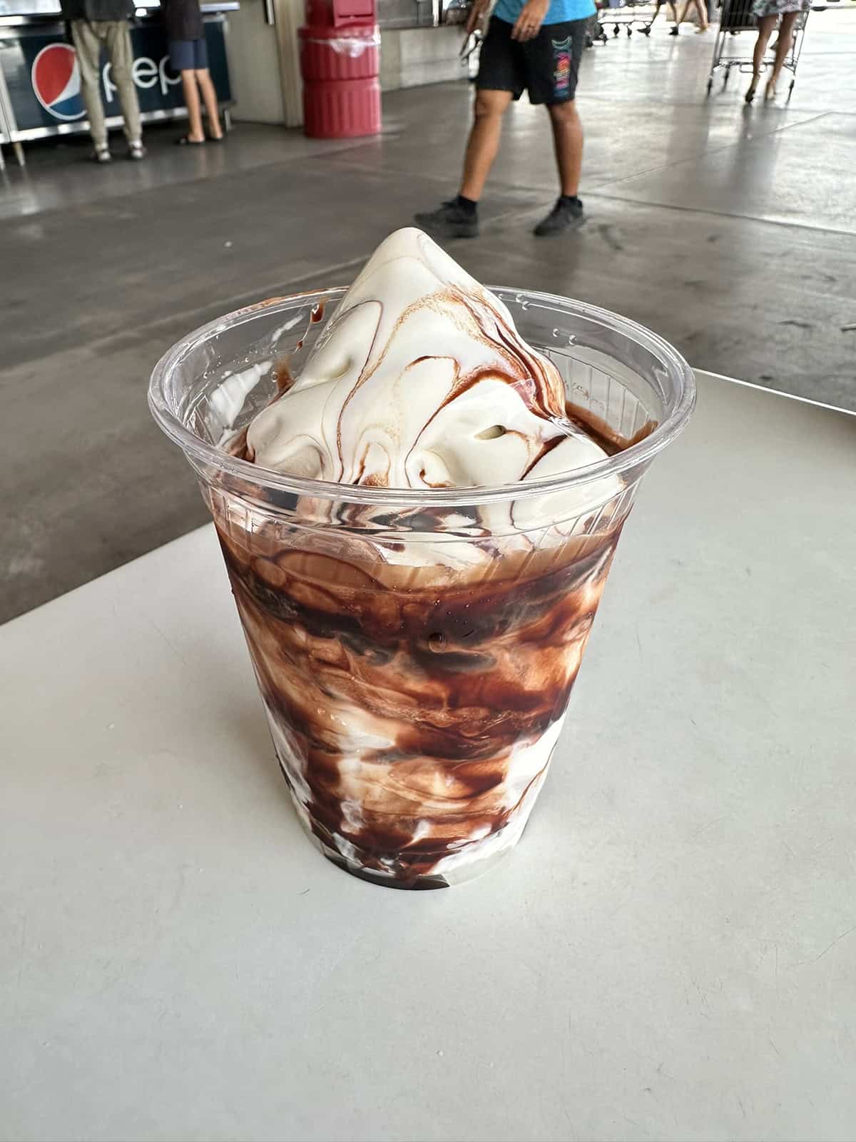 Image of a vanilla sundae with chocolate sauce from the Costco food court.