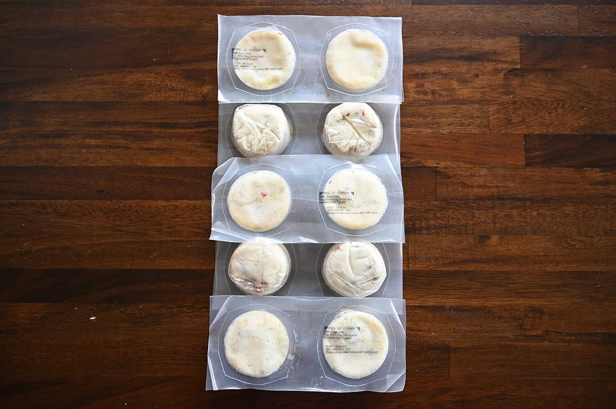 Top down image of the vacuum sealed packaged egg white bites on a table unopened.