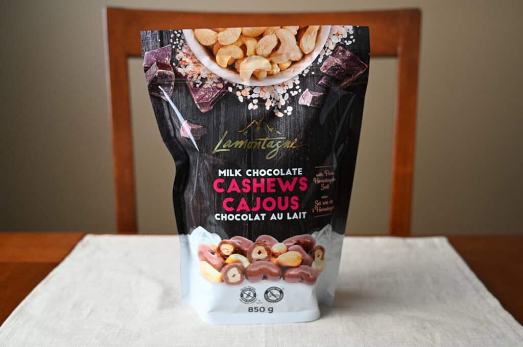 Image of the Costco Lamontagne Milk Chocolate Cashews bags sitting on a table unopened.