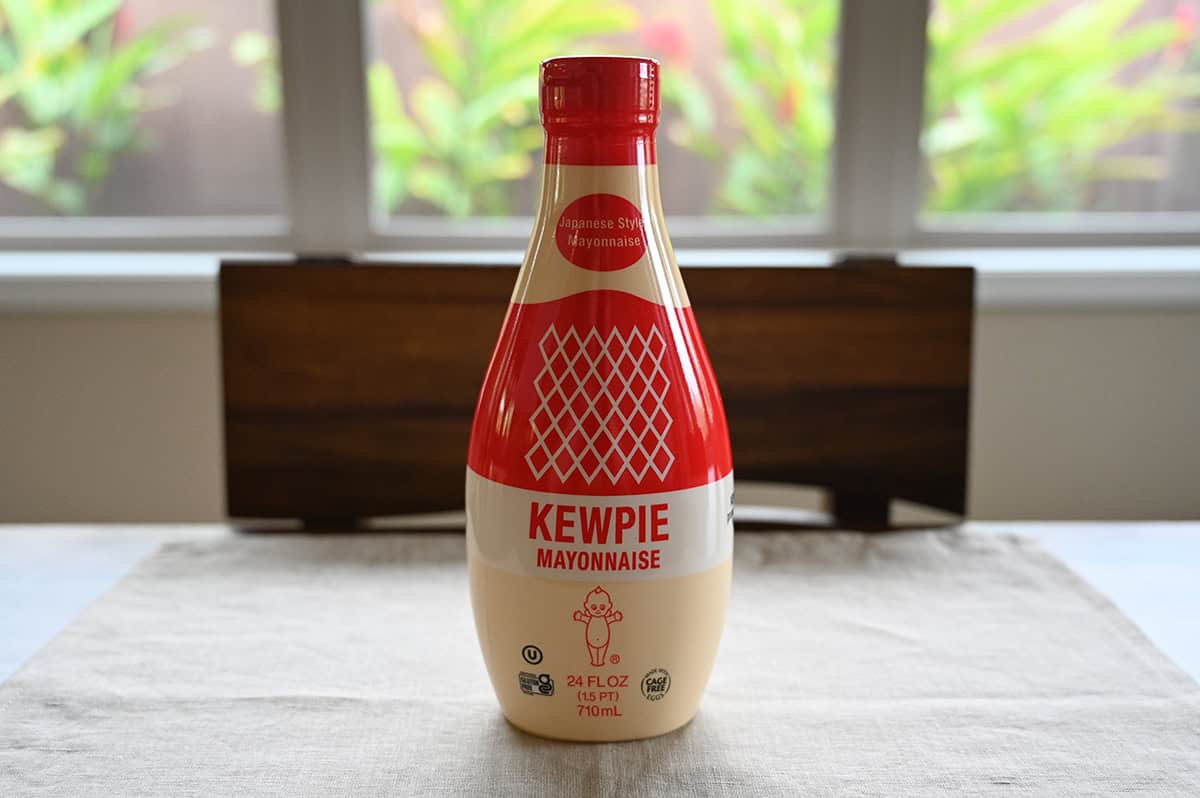 Image of the Costco Kewpie Mayonnaise bottle sitting on a table unopened.