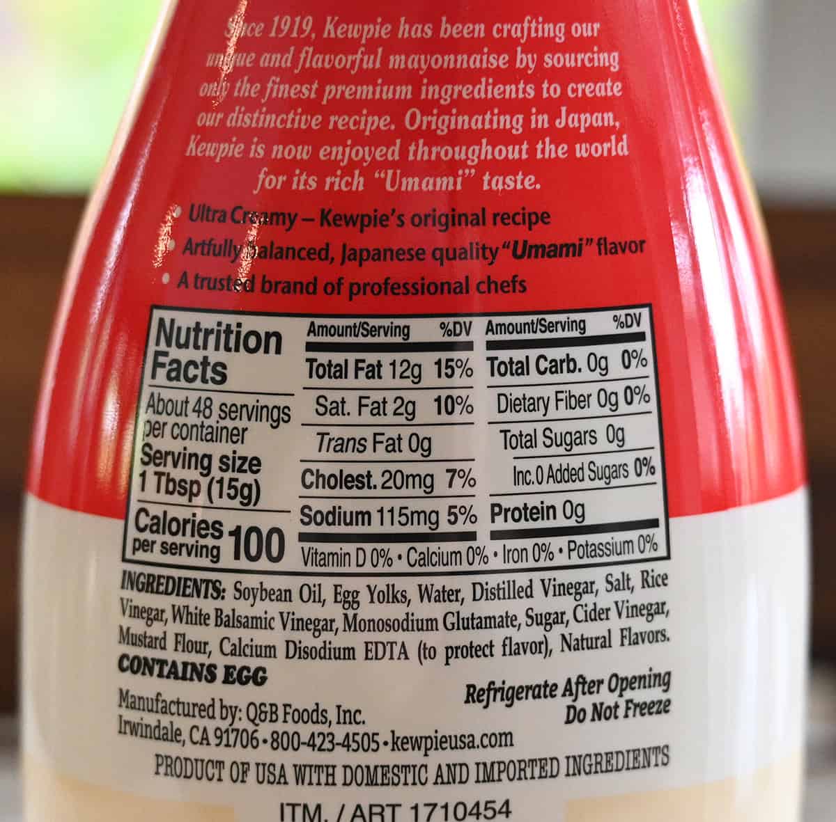 Image of the back of the bottle of Kewpie showing ingredients, nutrition facts and product description.