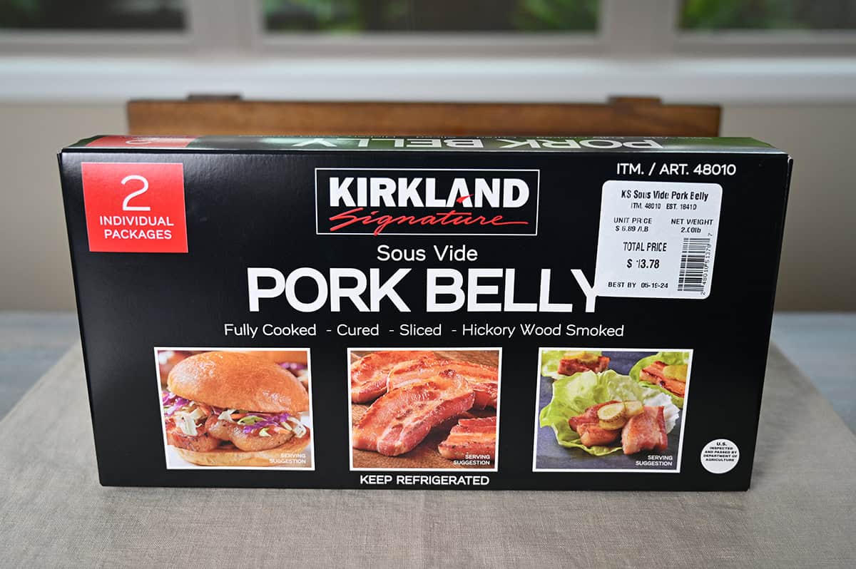 Image of the Costco Kirkland Signature Sous Vide Pork Belly box unopened sitting on a table.