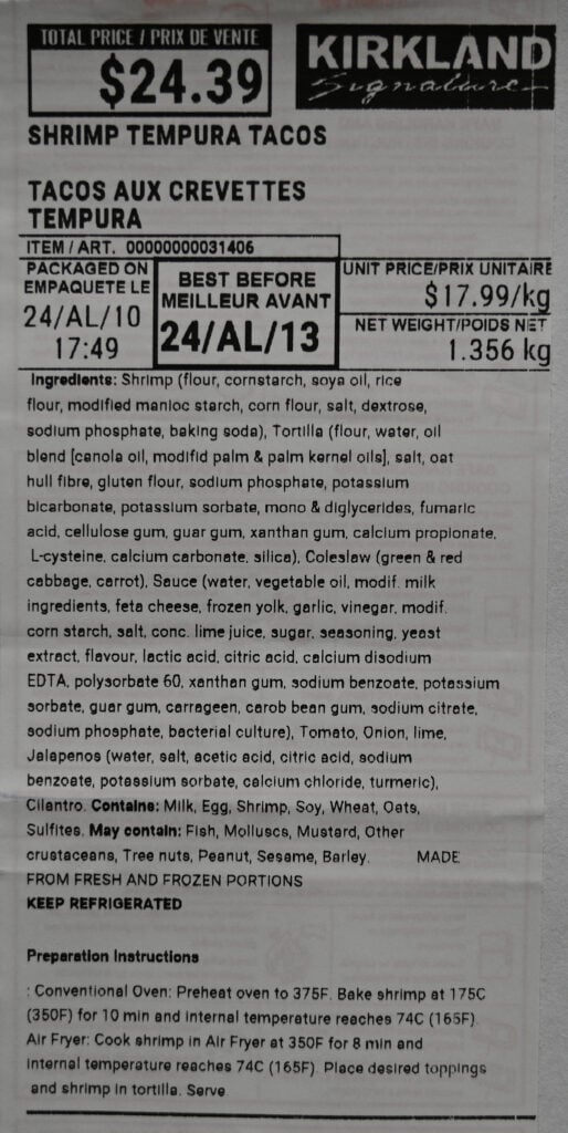 Closeup image of the front label on the shrimp tacos showing ingredients, best before date and cost.