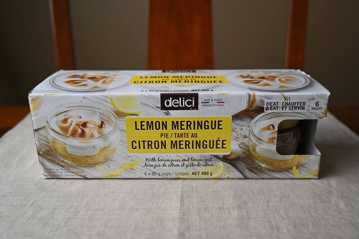 Image of the Costco Delici Lemon Meringue Pie box sitting on a table unopened.