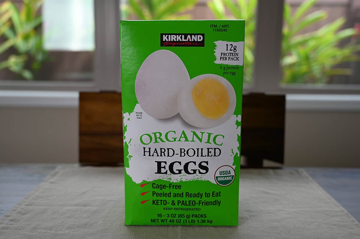 Image of the Costco Kirkland Signature Organic Hard-Boiled Eggs box sitting unopened on a table.