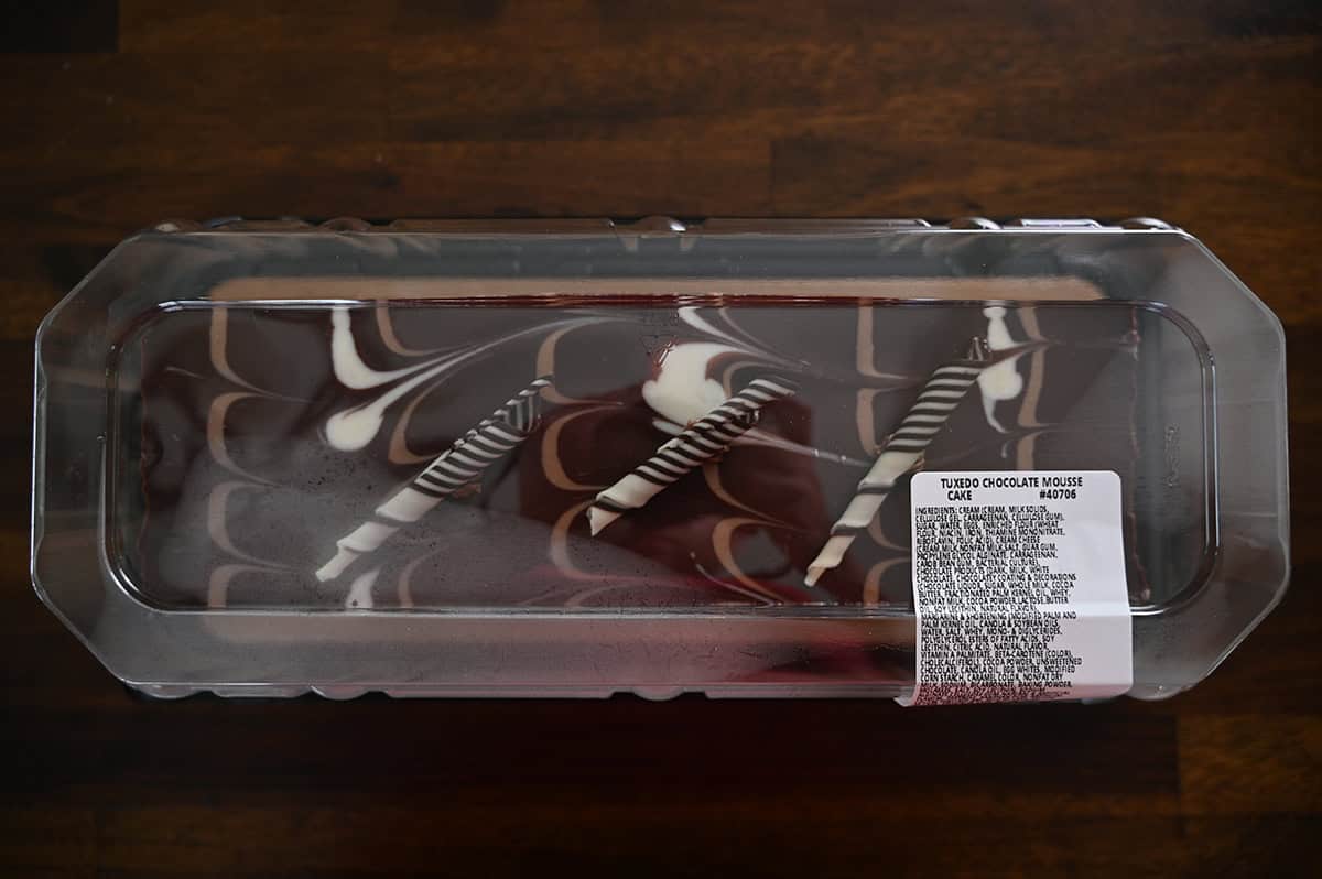 Top down image of the tuxedo cake unopened sitting in its packaging on a table.