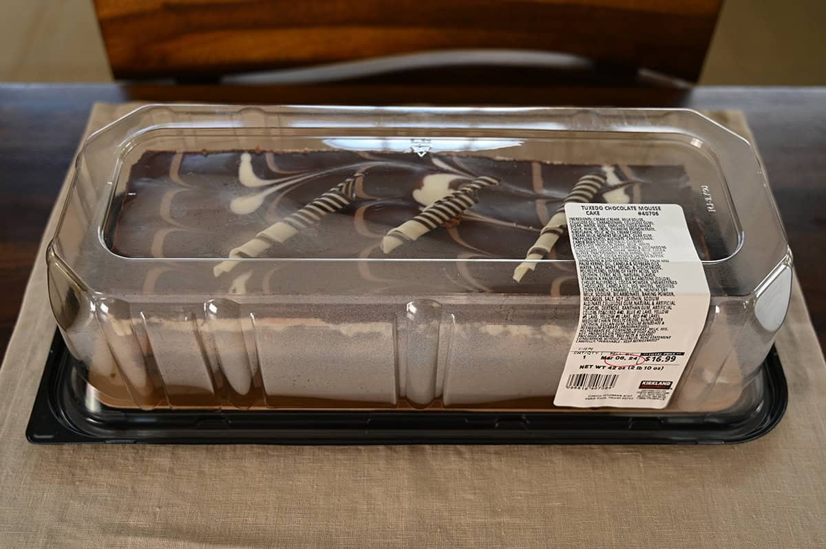 Top down image of the tuxedo cake unopened sitting in its packaging on a table.