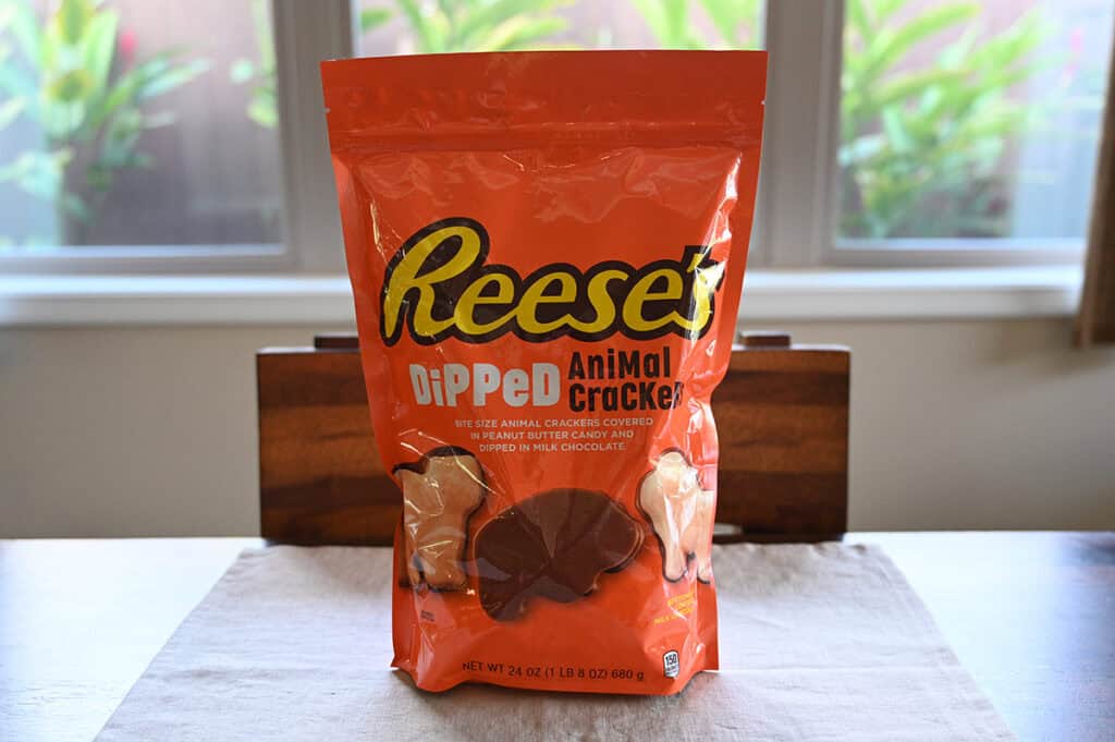 Image of the Reese's Dipped Animal Crackers Bag sitting on a table unopened. 