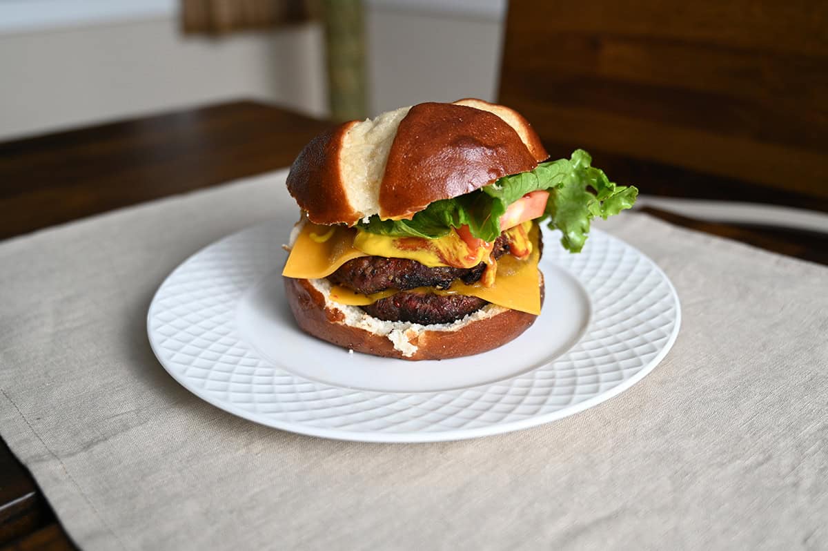 Closeup image of one double cheeseburger made using the ground angus chuck and beef burger patties.