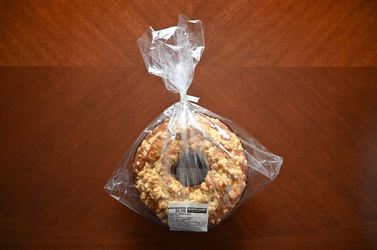 Top down image of one coffee cake unopened and sitting on a table.