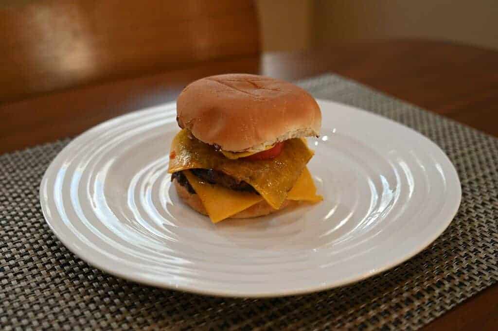 Closeup image of one double cheeseburger made using the lean ground beef burger patties.