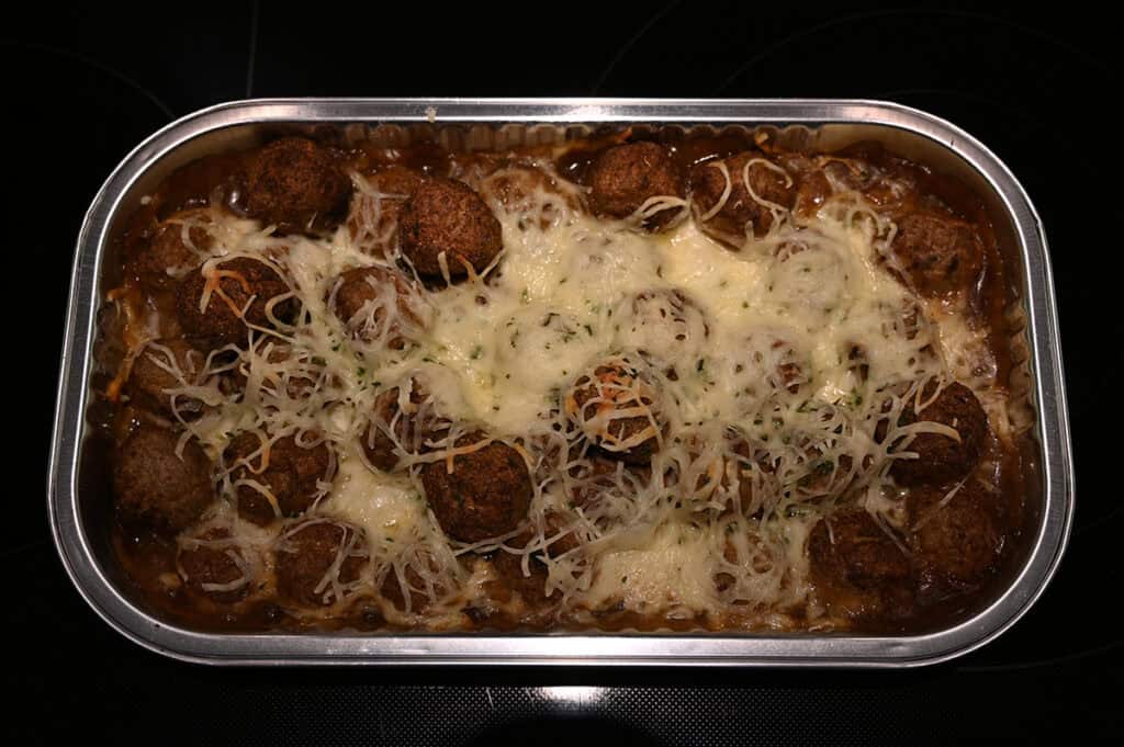 Top down closeup image of the French onion meatball bake after coming out of the oven.