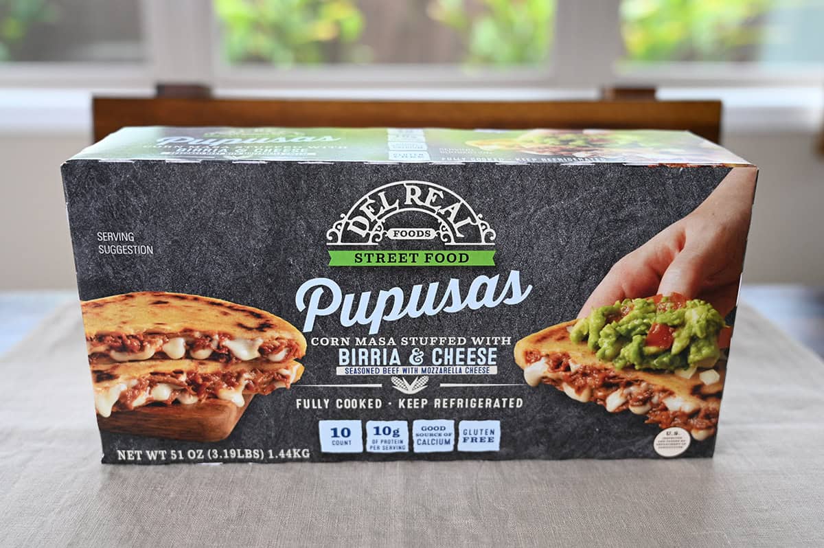 Image of the Costco Del Real Foods Pupusas box sitting on a table unopened.