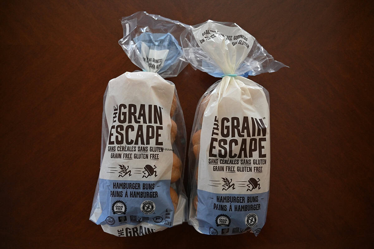 Image of two smaller unopened bags of The Grain Escape hamburger buns.