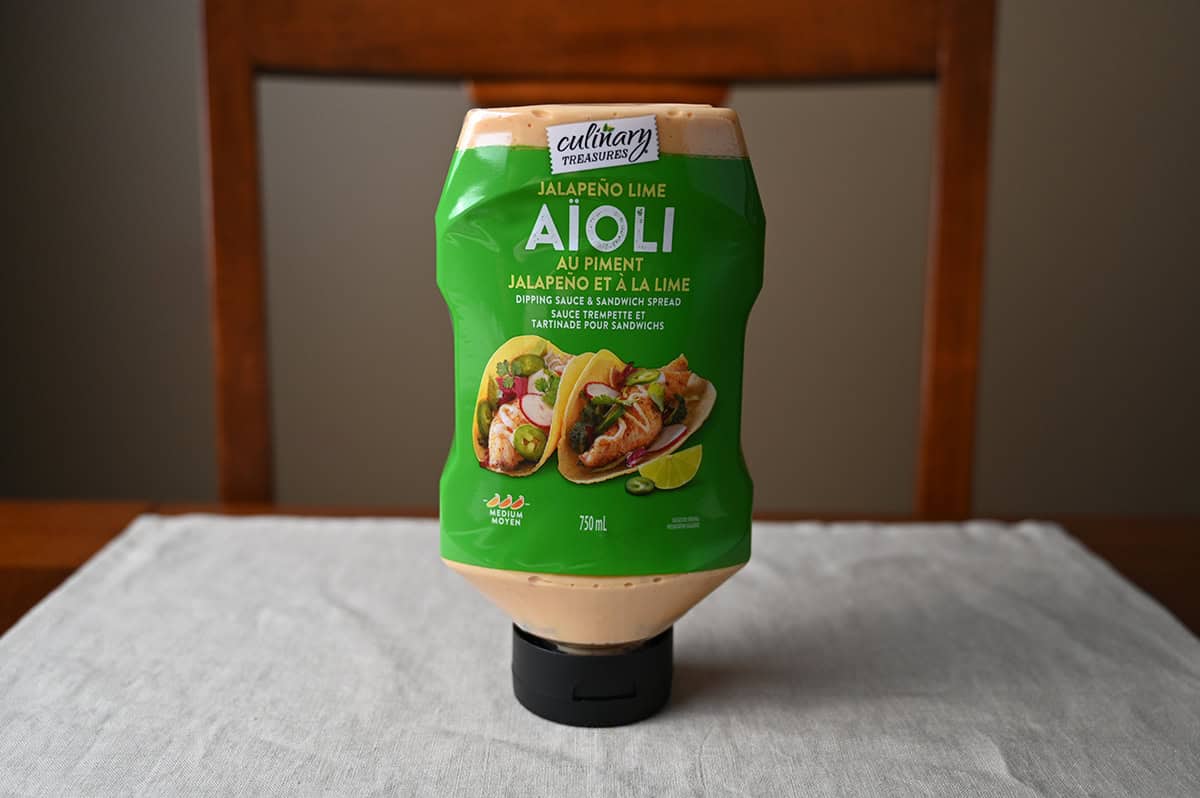 Image the Culinary Treasures Jalapeno Lime Aioli bottle sitting on a table unopened.