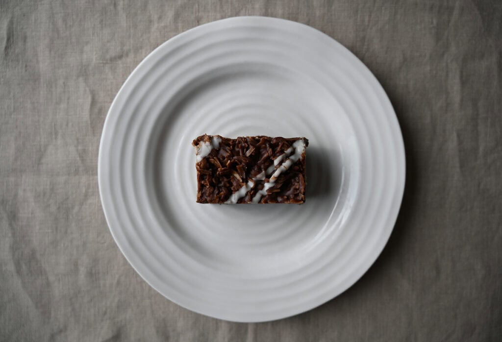 Image of one haystack brownie served on a white plate. 