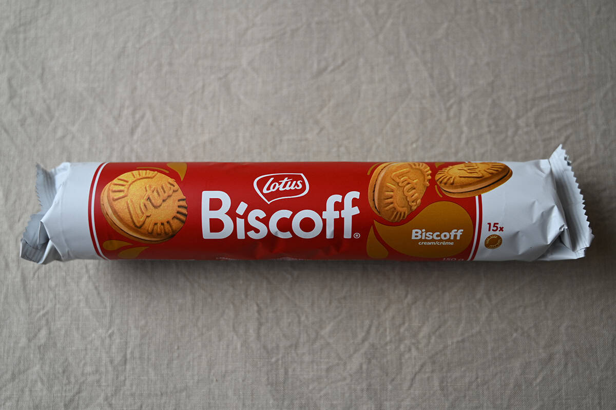 Image of one sleeve of Lotus Biscoff Sandwich Cookies sitting on a table unopened.