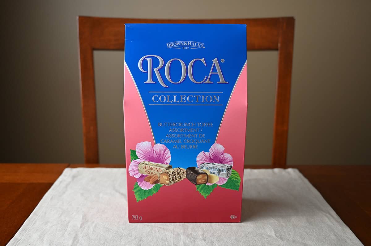 Image of the Costco Brown & Haley Roca Collection Buttercrunch Toffee Assortment box sitting on a table unopened.