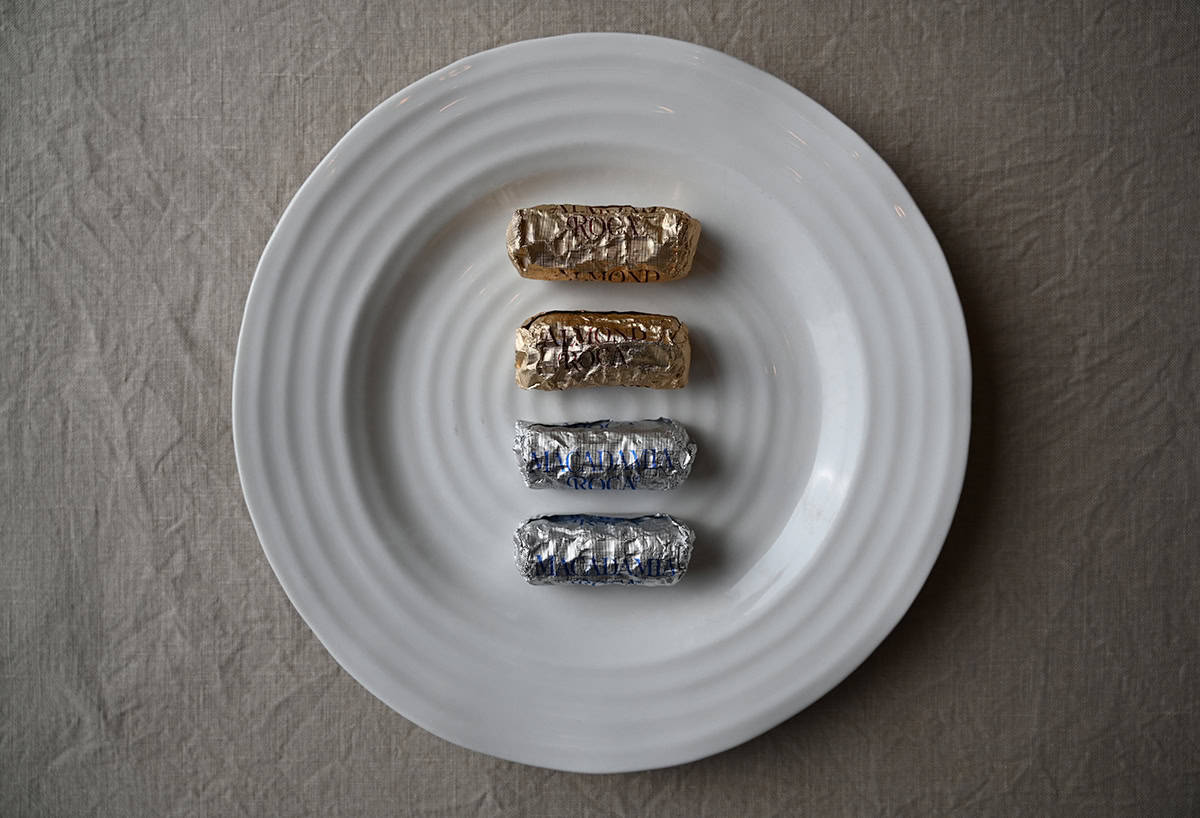 Image of four individually wrapped Roca chocolates on a plate.