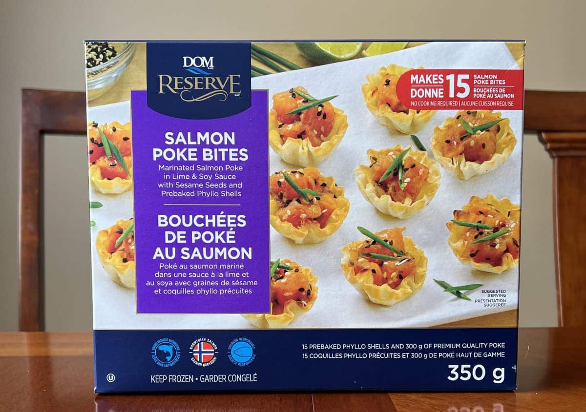 Image of the Costco Dom Reserve Salmon Poke Bites box sitting on a table unopened.