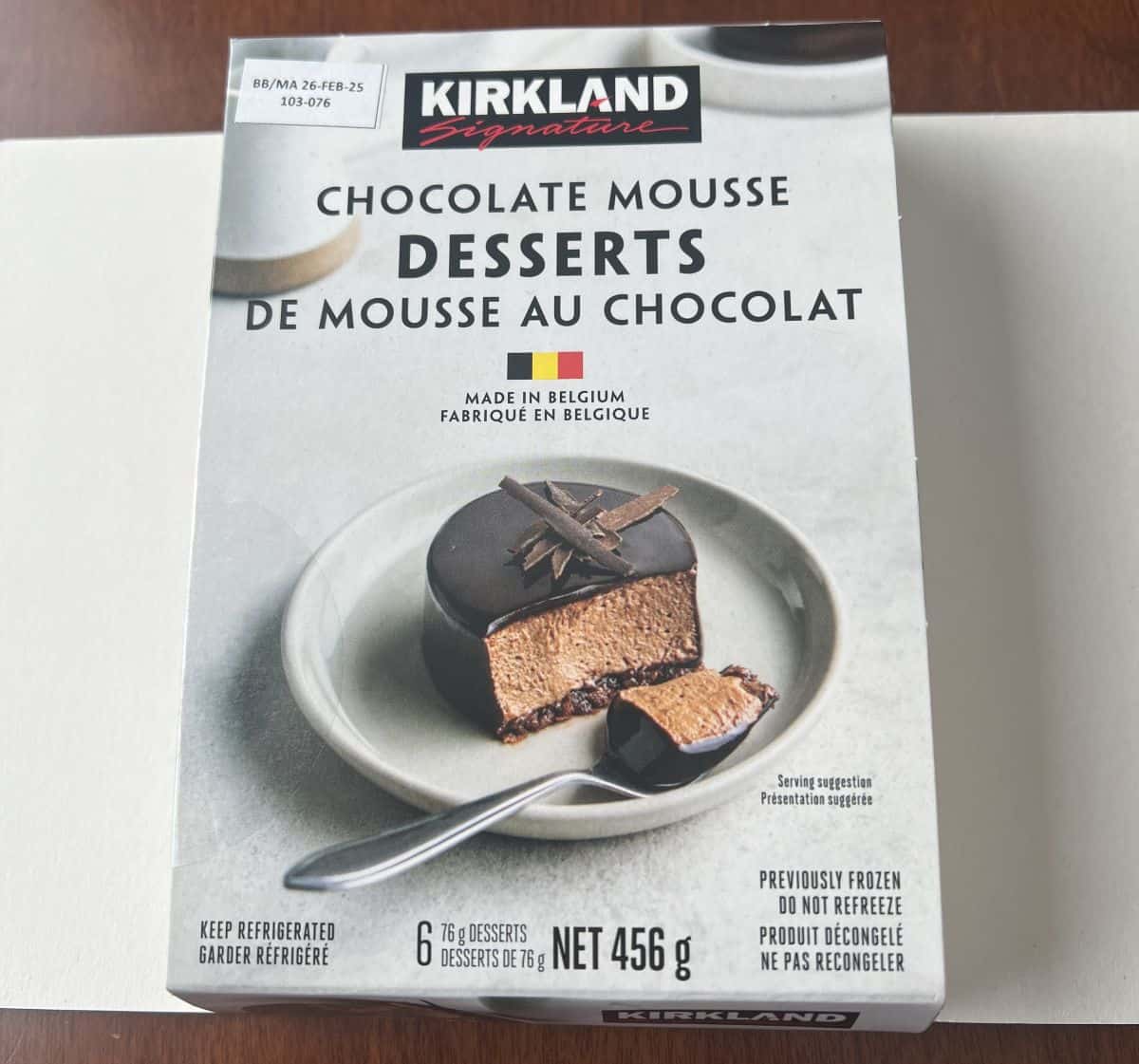 Image of the Costco Kirkland Signature Chocolate Mousse Desserts cardboard packaging showing the weight of the package, how many desserts there are.