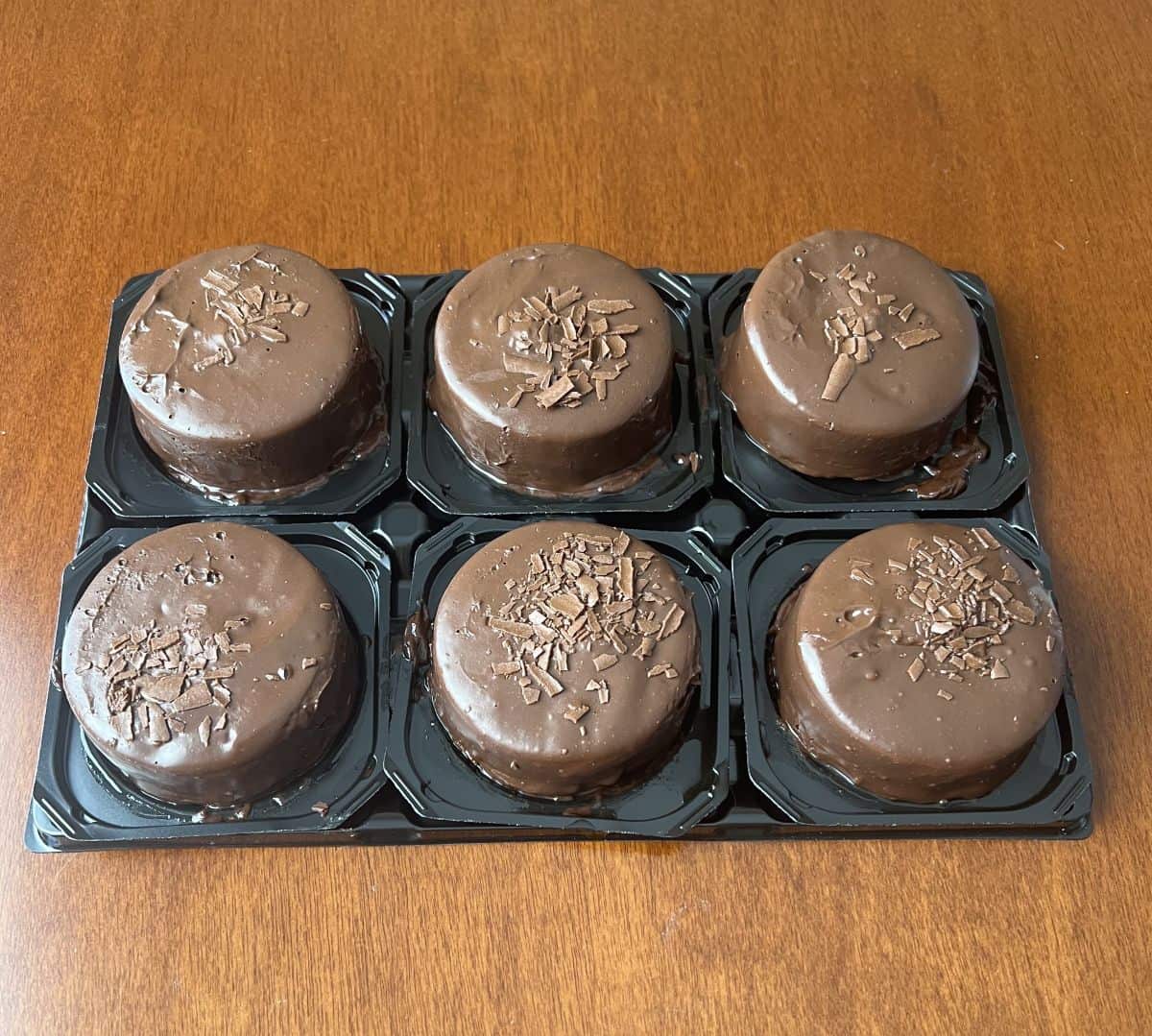 Image of the open package of Costco Kirkland Signature Chocolate Mousse Desserts showing six desserts in the pack.