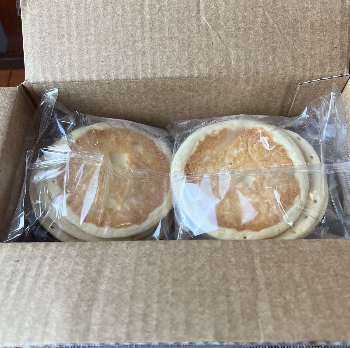 Image of the box of pancakes opened showing the packs of pancakes in the box.