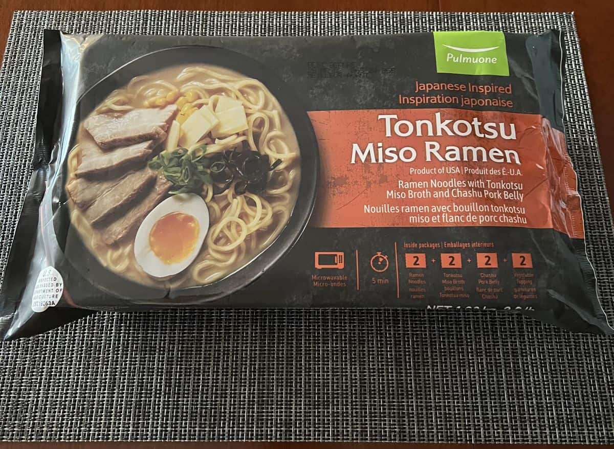 Image of the Costco Pulmuone Tonkotsu Miso Ramen package sitting on a table unopened.