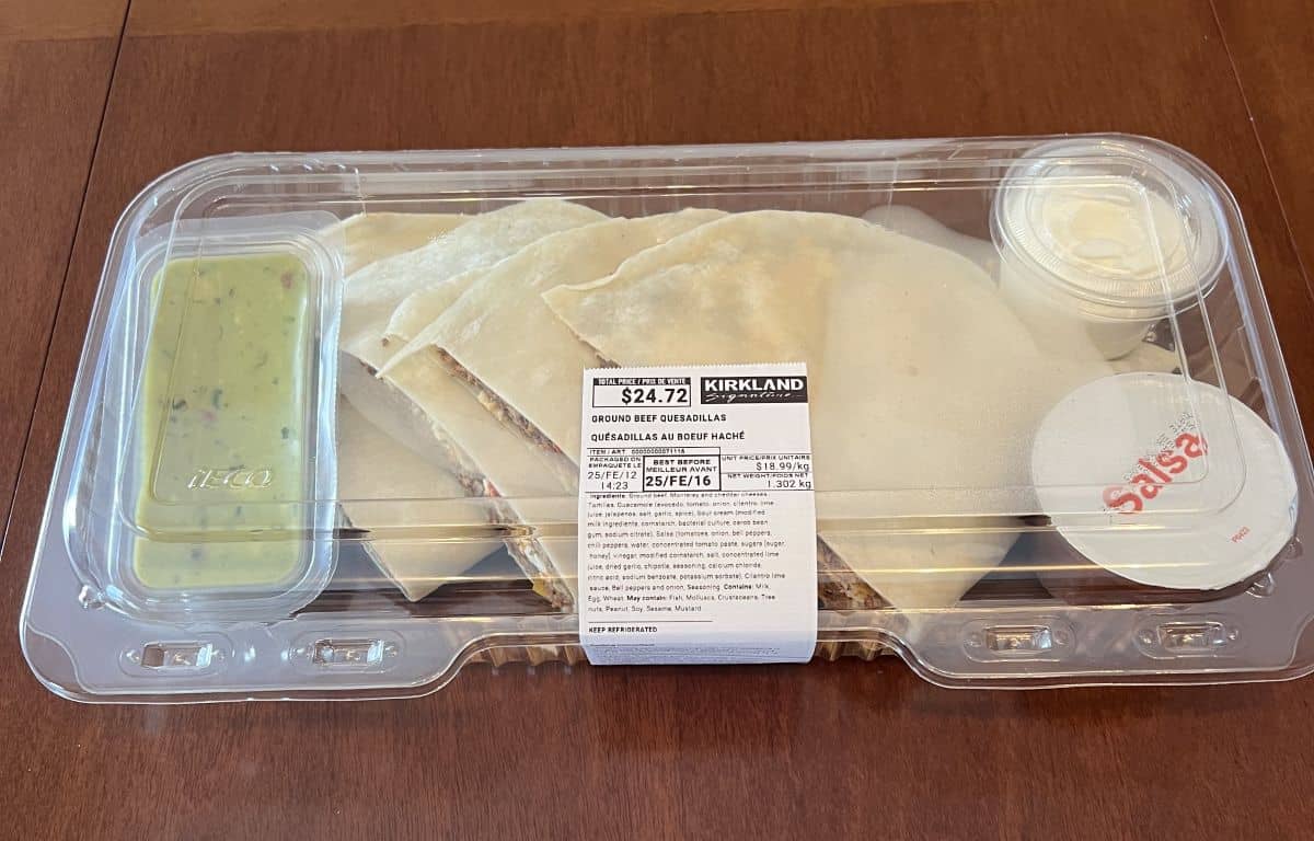 Image of the Costco Kirkland Signature Ground Beef Quesadillas meal sitting on a table unopened.