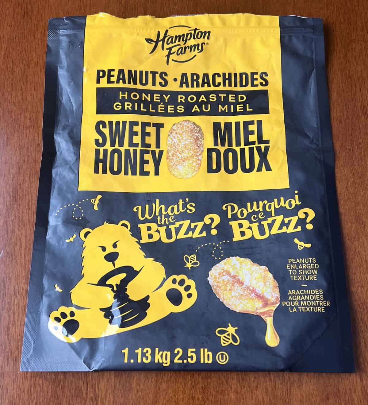 Closeup image of the bag of honey roasted peanuts showing the weight of the bag.