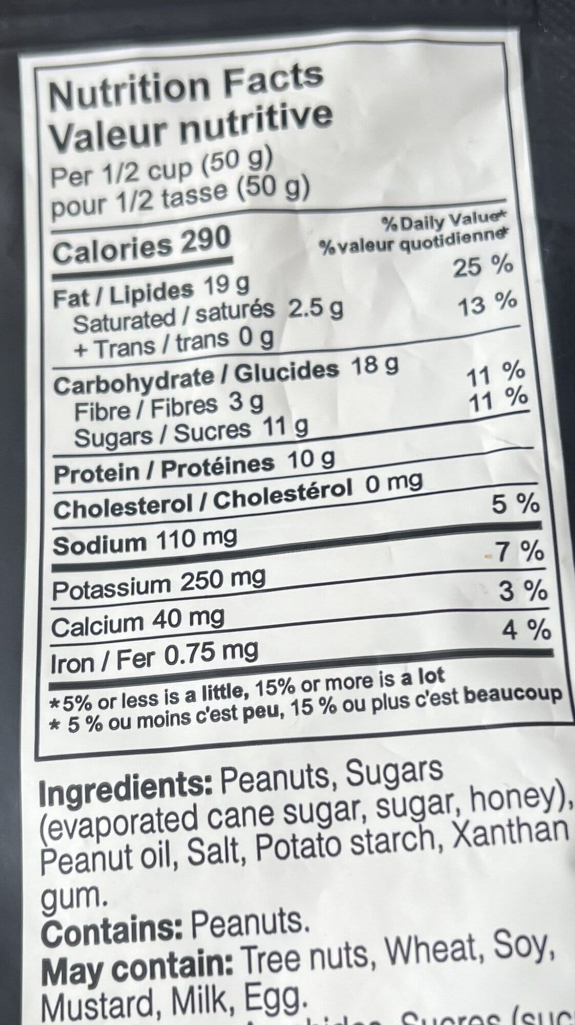 Image of the nutrition facts and ingredients list for the peanuts from the back of the bag.