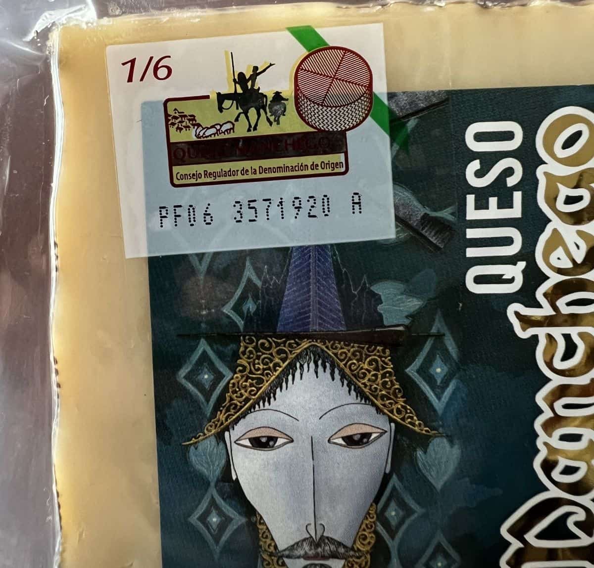 Image of a sticker on the packaging of the manchego cheese showing it's imported from Spain. 